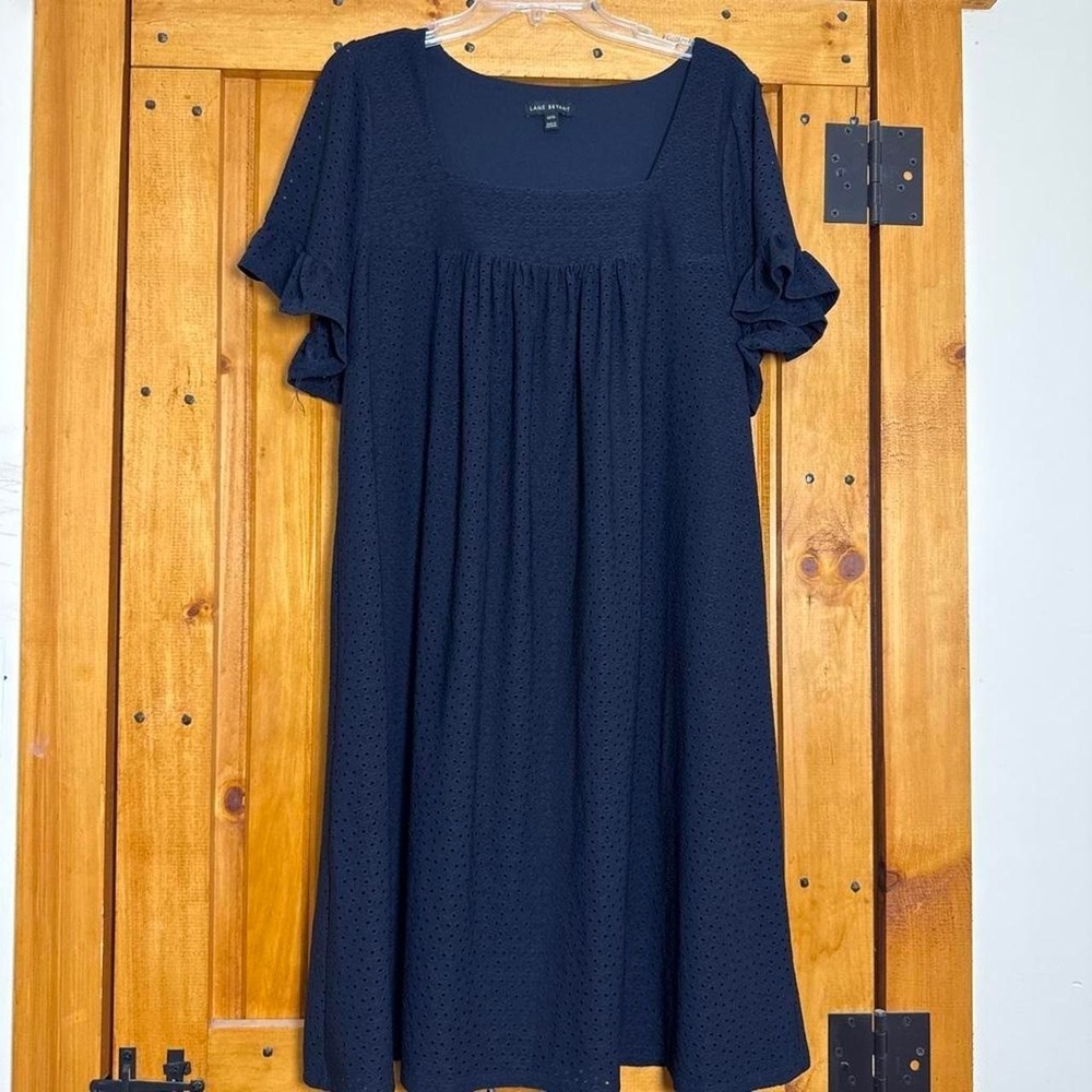 Lane Bryant navy blue eyelet dress features a square neckline and flutter sleeve